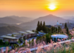 Sunset over a mountain resort in spring.